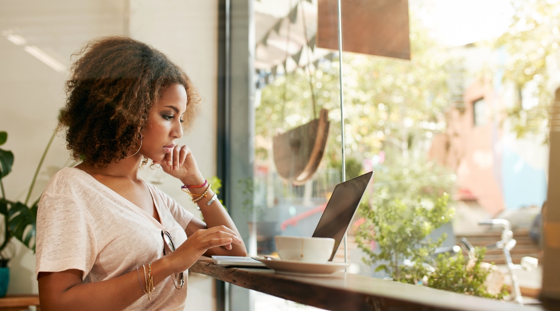 Business owner learning how to create a website for their business